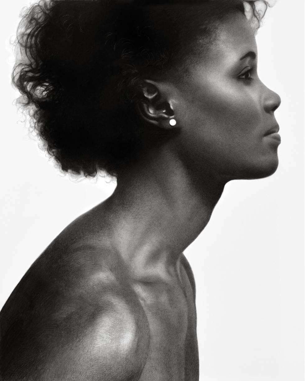 profile of woman with man's shoulders